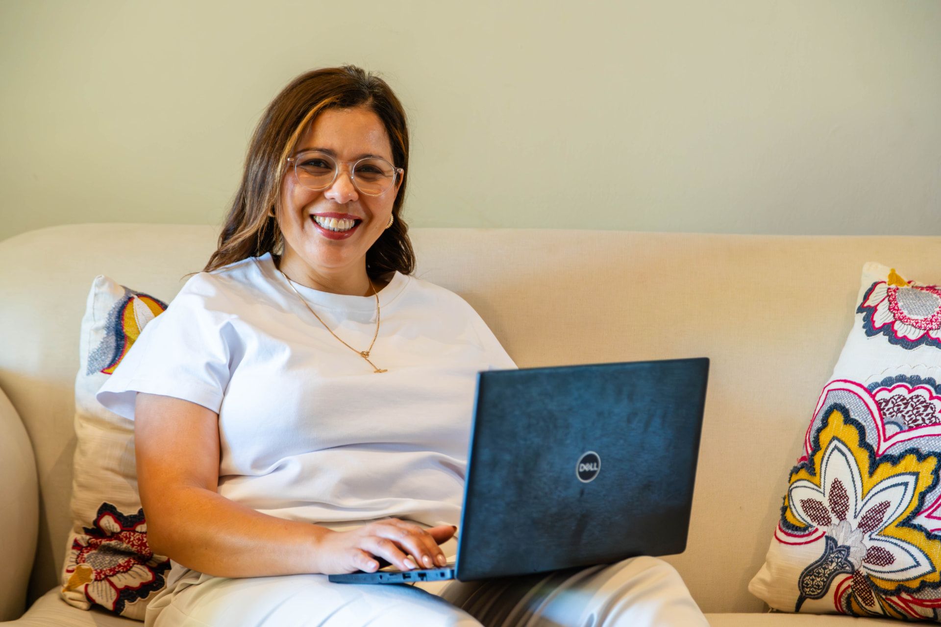 Guest working comfortably on a laptop in the Staymore lounge