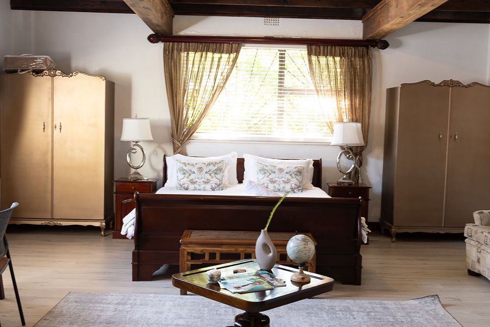 Spacious Deluxe King room with king-size sleigh bed